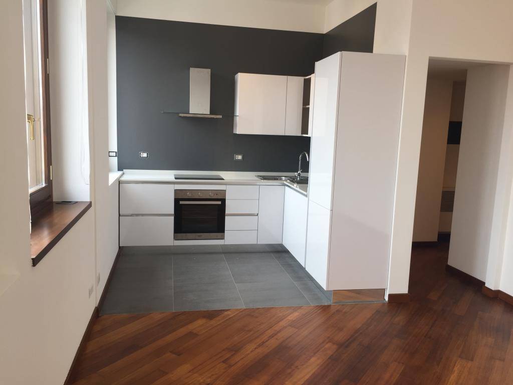 Soggiorno con cucina a vista 